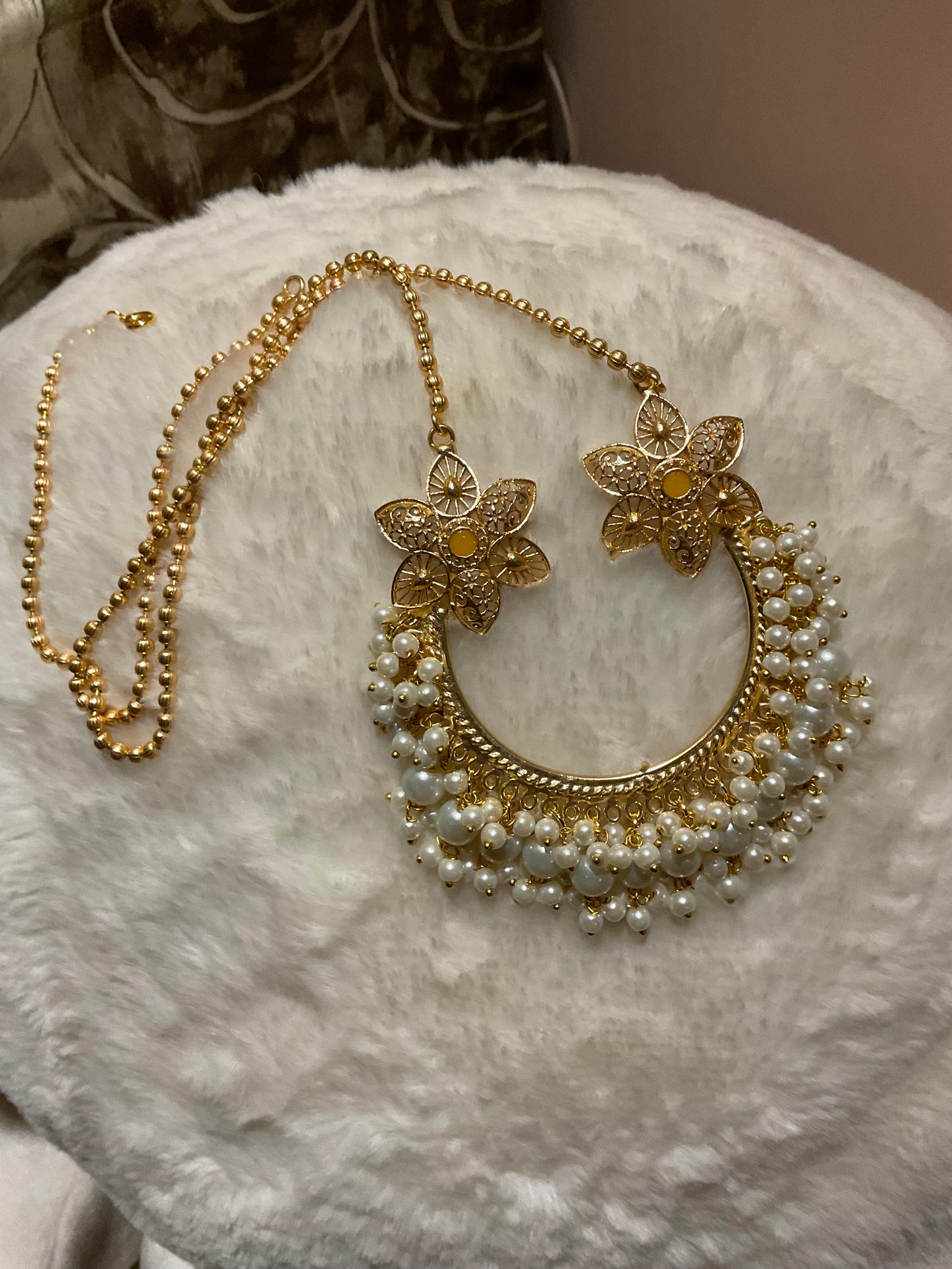 Golden handmade neck piece