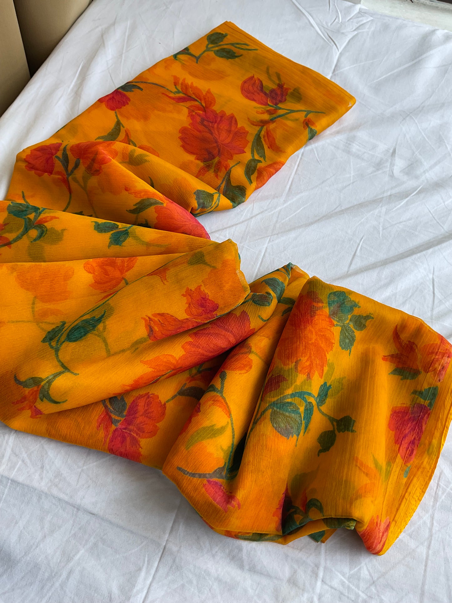 Beautiful semi chiffon floral yellow saree