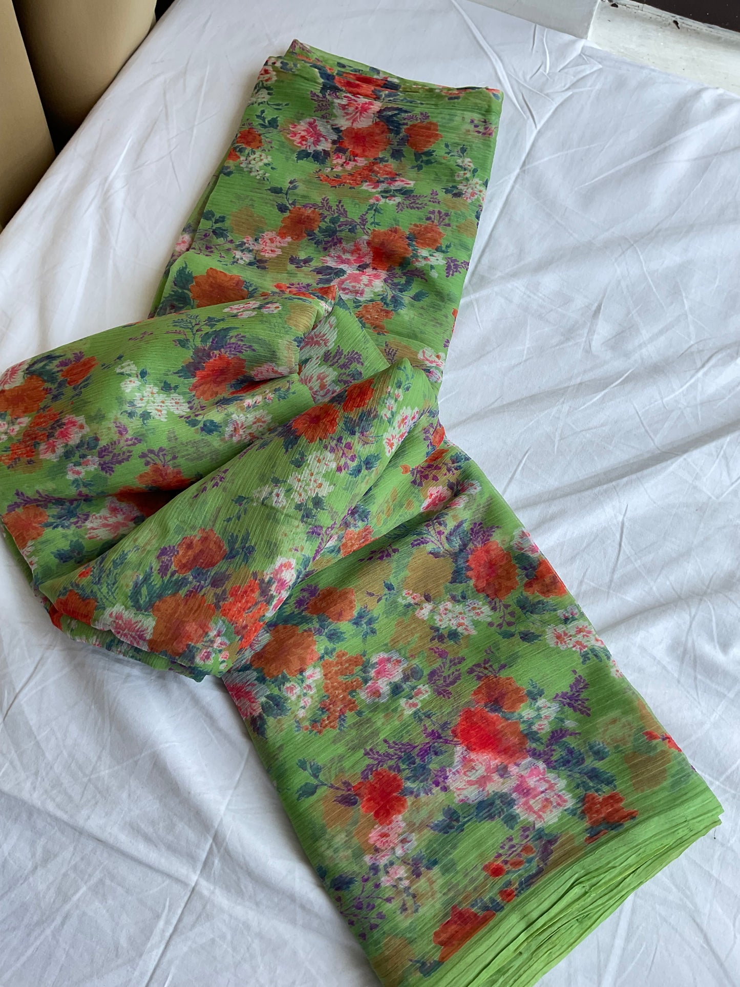 Beautiful semi chiffon floral light green colour saree