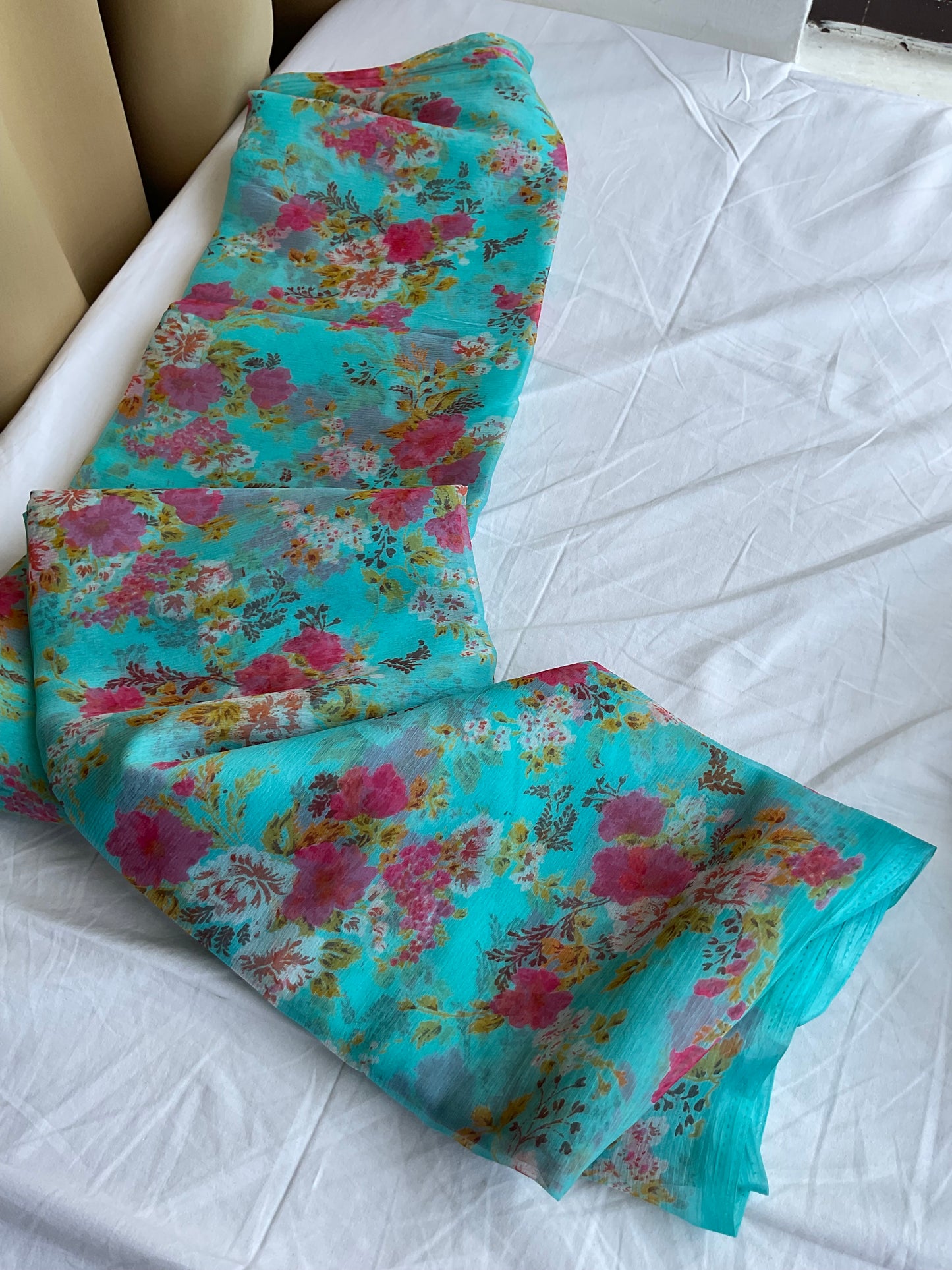 Beautiful semi chiffon floral sky blue saree